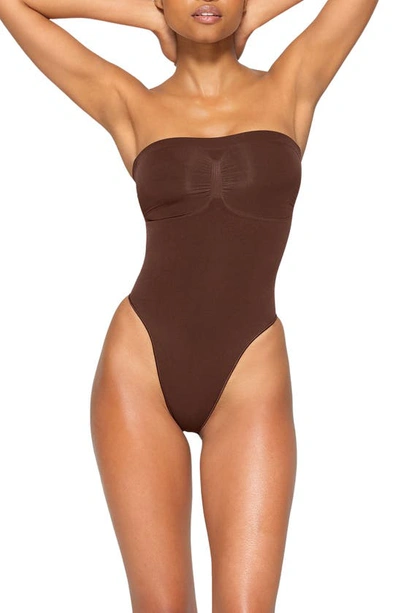 SKIMS Seamless Sculpt strapless thong bodysuit - Onyx