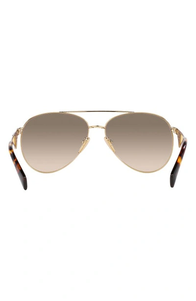 Shop Prada 56mm Gradient Pilot Sunglasses In Pale Gold