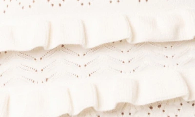 Shop Edikted Robin Pointelle Ruffle Strapless Knit Romper In Cream