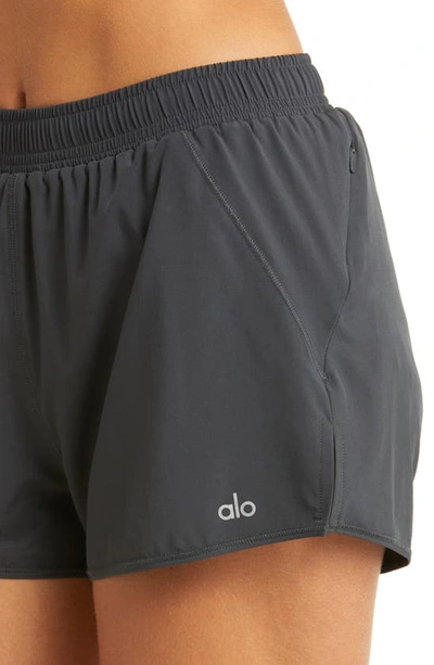 Shop Alo Yoga Stride Shorts In Anthracite