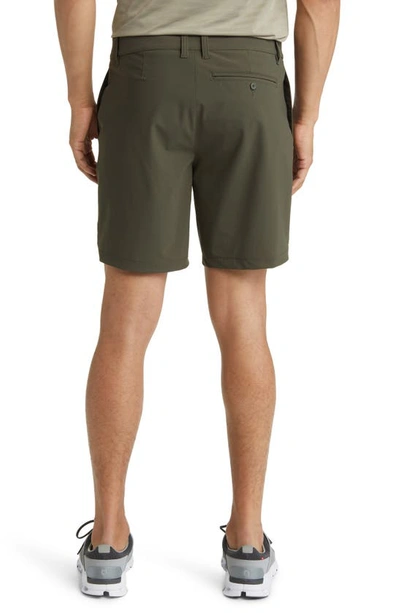 Shop Rhone Flat Front 8-inch Resort Shorts In Survivor Green