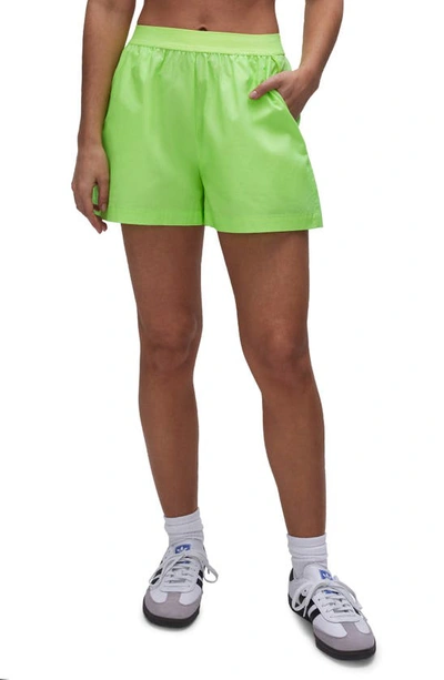 Shop Good American Coated Cotton Poplin Shorts In Electric Lime002