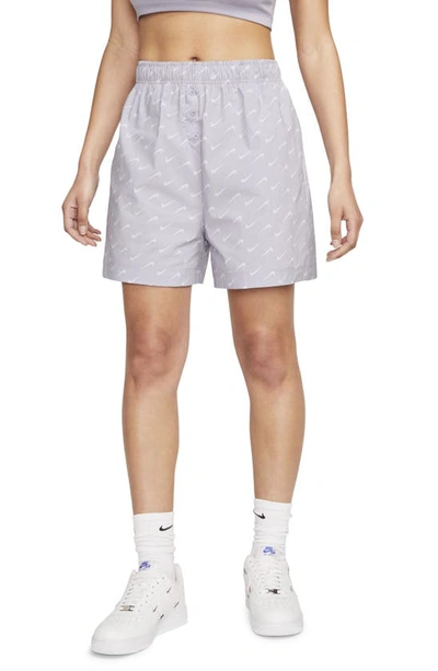 Shop Nike Sportswear Swoosh Print Shorts In Indigo Haze/indigo Haze