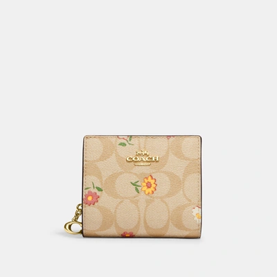 Shop Coach Outlet Snap Wallet In Signature Canvas With Nostalgic Ditsy Print In Beige