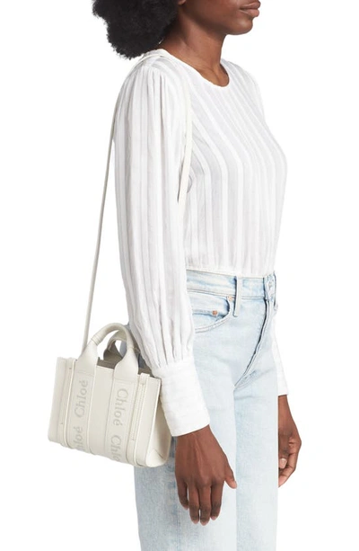 Shop Chloé Mini Woody Leather Tote In White 101