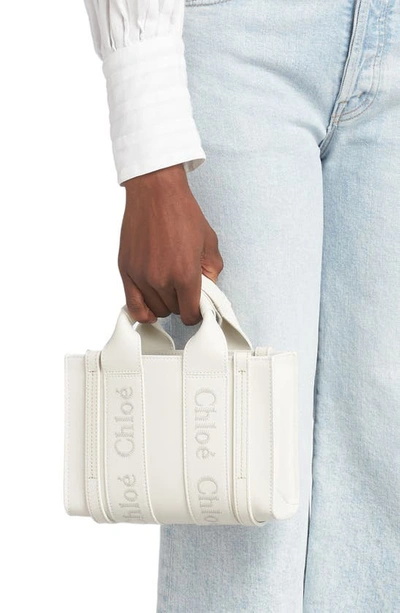 Shop Chloé Mini Woody Leather Tote In White 101