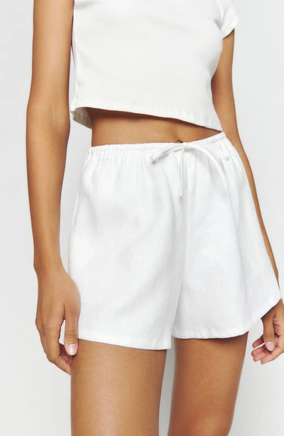 Shop Reformation Zoey Linen Shorts In White