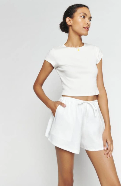 Shop Reformation Zoey Linen Shorts In White