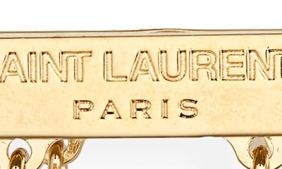 Shop Saint Laurent Mismatched Logo Bar Earrings In Dore