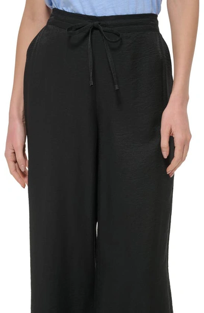 Shop Dkny Crinkle Wide Leg Pants In Black