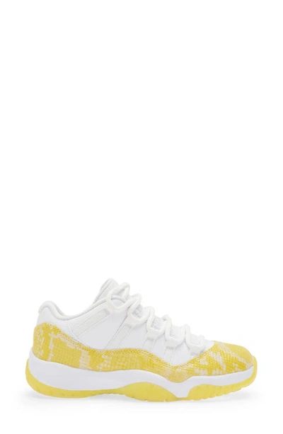 Shop Jordan Nike Air  11 Retro Low Sneaker In White/ Tour Yellow/ White