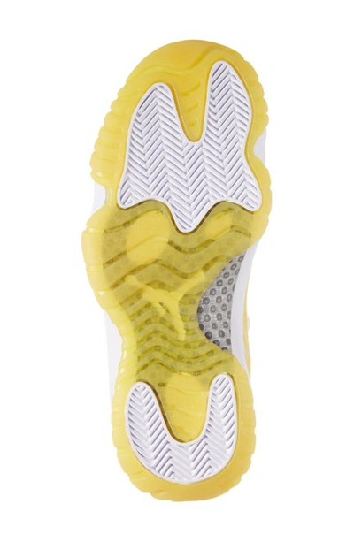Shop Jordan Nike Air  11 Retro Low Sneaker In White/ Tour Yellow/ White
