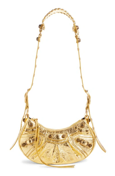 Shop Balenciaga Extra Small Le Cagole Metallic Calfskin Shoulder Bag In Gold