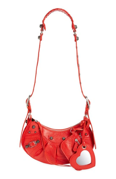 Shop Balenciaga Extra Small Le Cagole Lambskin Shoulder Bag In Tomato Red