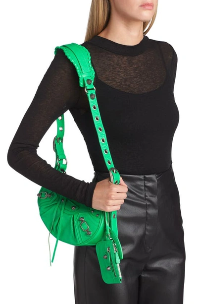 Shop Balenciaga Extra Small Le Cagole Lambskin Shoulder Bag In Vivid Green