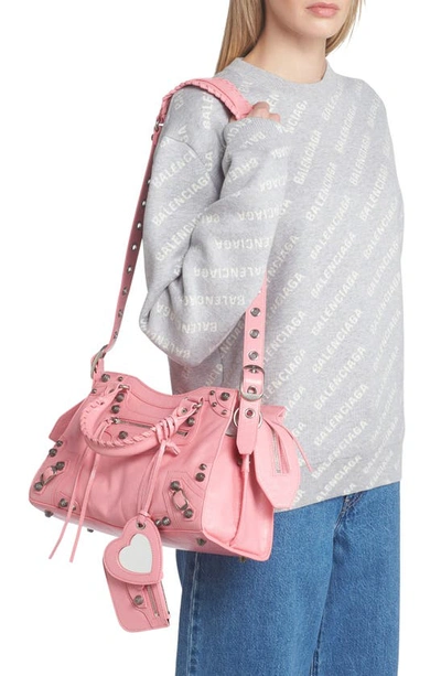 Shop Balenciaga Small Neo Cagole Leather Shoulder Bag In Sweet Pink