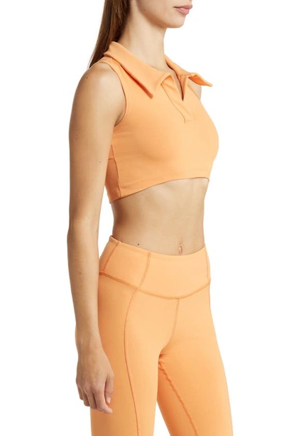Shop Solely Fit Fearless Back Cutout Crop Polo In Apricot
