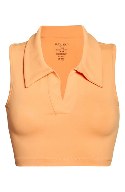 Shop Solely Fit Fearless Back Cutout Crop Polo In Apricot