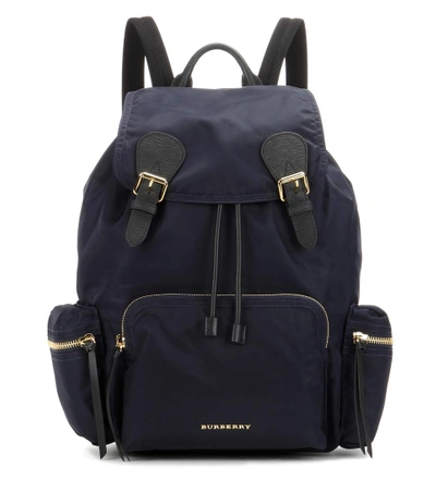 Shop Burberry The Medium Leather-trimmed Backpack In Llue Iek