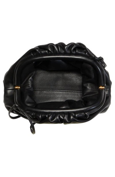 Shop Bottega Veneta The Mini Pouch Calfskin Leather Crossbody Bag In Black Gold