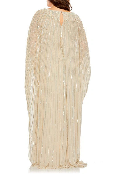 Shop Fabulouss By Mac Duggal Sequin Long Sleeve Cape Overlay Gown In Champagne