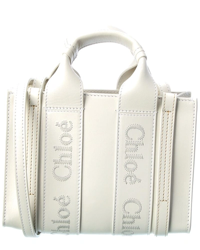 Shop Chloé Woody Mini Leather Tote In White