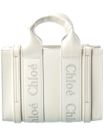 Shop Chloé Woody Mini Leather Tote In White