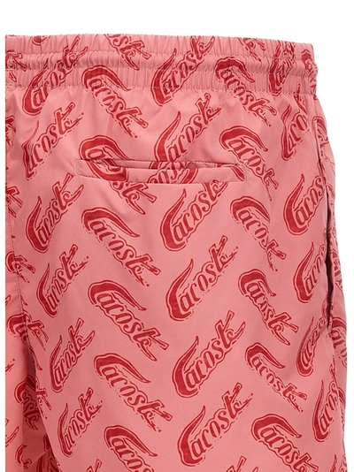 Shop Lacoste Logo Print Swimming Trunks Beachwear Pink