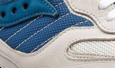 Shop Saucony Gender Inclusive 3d Grid Hurricane Sneaker In Cream/ Blue