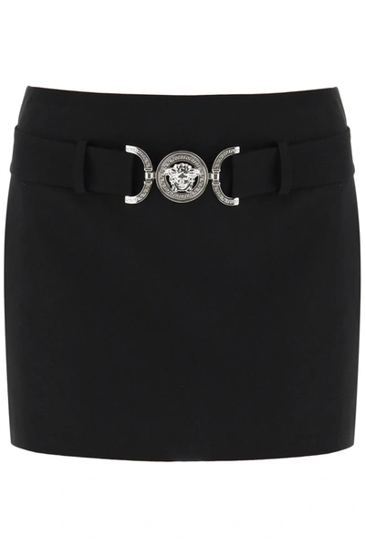 Shop Versace Medusa Buckle Mini Skirt