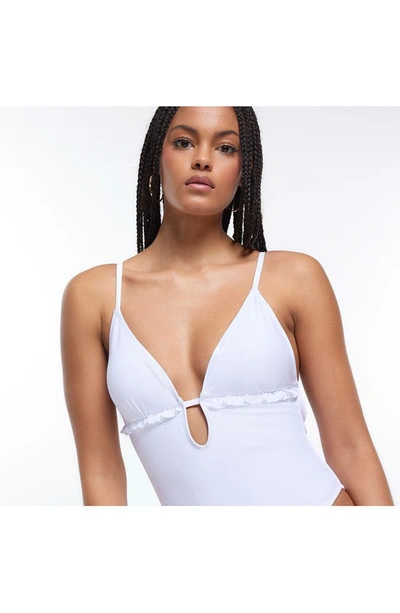 Shop River Island Frill Plunge One-piece Swimsuit In White