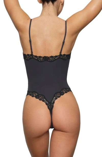 Skims Fits Everybody Lace-trimmed Stretch Thong Bodysuit in Black