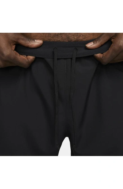 Shop Nike Dri-fit Challenger 5-inch Brief Lined Shorts In Black/ Black/ Black