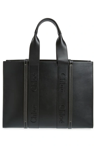 Shop Chloé Large Woody Leather Tote In Black 001