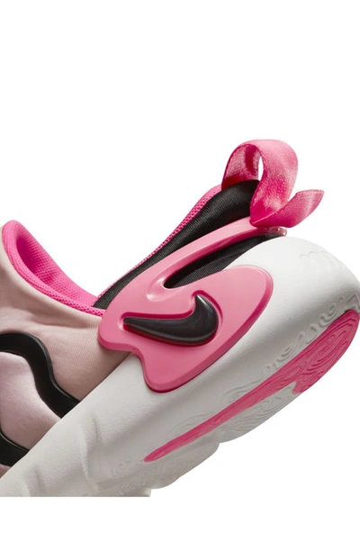 Shop Nike Kids' Dynamo Go Sneaker In Soft Pink/ Pink/ White/ Black