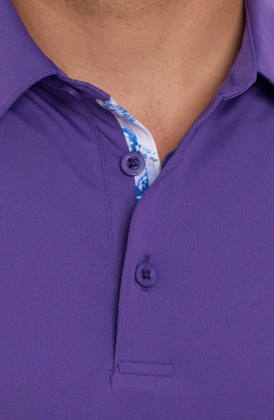 Shop Robert Graham Axelsen Solid Short Sleeve Performance Golf Polo In Purple