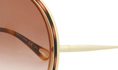 Shop Chloé Novelty 61mm Round Sunglasses In Gold Orange