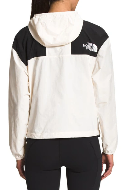 Shop The North Face '86 Mountain Wind Resistant Jacket In Gardenia White