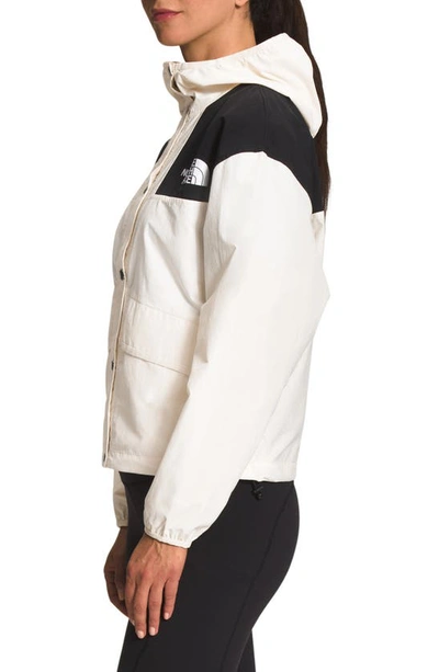 Shop The North Face '86 Mountain Wind Resistant Jacket In Gardenia White