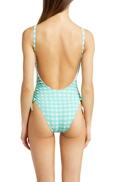 Shop Vitamin A Gemma Cinched Side Tie One-piece Swimsuit In Seafoam Pucker Gingham