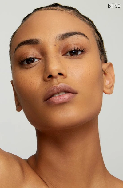 Clé De Peau Beauté Cle De Peau Beaute Radiant Fluid Foundation Matte Broad Spectrum Spf 20 Sunscreen 1.1 Oz. In Bf50 - Tan Buff