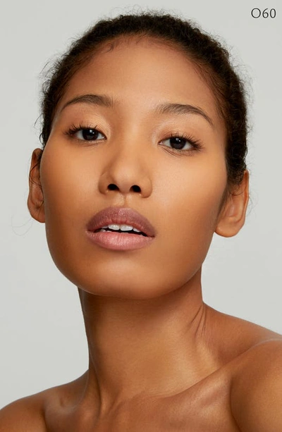 Clé De Peau Beauté Cle De Peau Beaute Radiant Fluid Foundation Matte Broad Spectrum Spf 20 Sunscreen 1.1 Oz. In O60 - Deep Tan Ocher