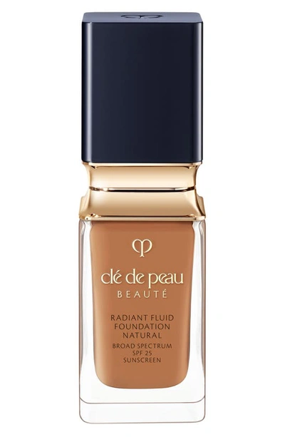 Shop Clé De Peau Beauté Beauté Radiant Fluid Natural Foundation In O70 - Medium Deep Ocher