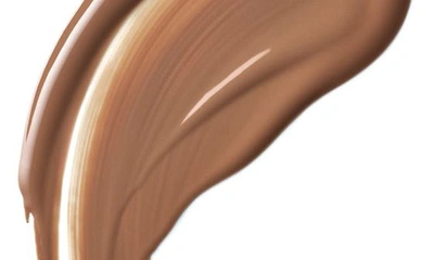 Clé De Peau Beauté Radiant Fluid Natural Foundation In O70 - Medium Deep Ocher