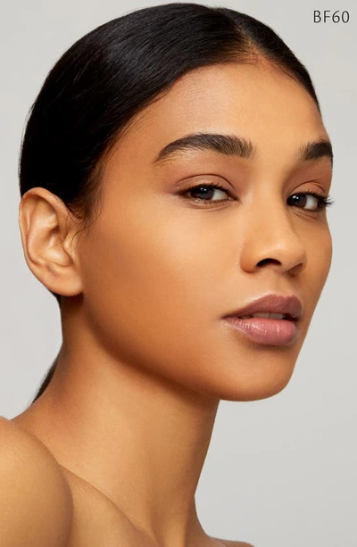 Clé De Peau Beauté Radiant Fluid Natural Foundation In Bf60 - Deep Tan Buff