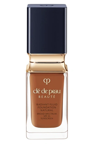 Shop Clé De Peau Beauté Beauté Radiant Fluid Natural Foundation In O100 - Rich Deep Ocher