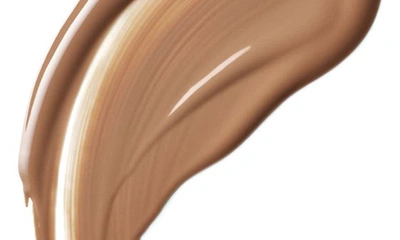 Clé De Peau Beauté Radiant Fluid Natural Foundation In Bf60 - Deep Tan Buff