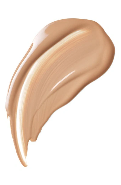 Shop Clé De Peau Beauté Beauté Radiant Fluid Natural Foundation In Bf50 - Tan Buff