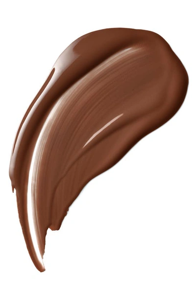 Clé De Peau Beauté Radiant Fluid Natural Foundation In B100 - Rich Deep Beige