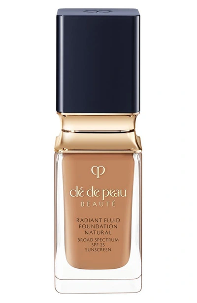 Shop Clé De Peau Beauté Beauté Radiant Fluid Natural Foundation In O60 - Deep Tan Ocher